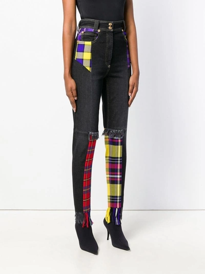 Shop Versace Checked High-waist Jeans - Black
