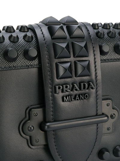 Shop Prada Studded Cahier Cross-body Bag - Black