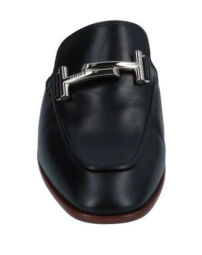 Shop Tod's Mules In Black