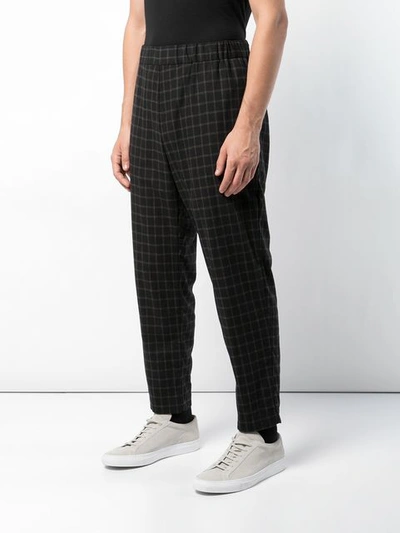 checked straight trousers