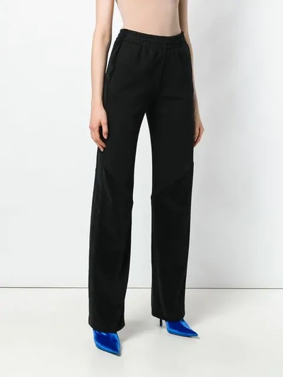 Shop Givenchy High Rise Track Pants In Black