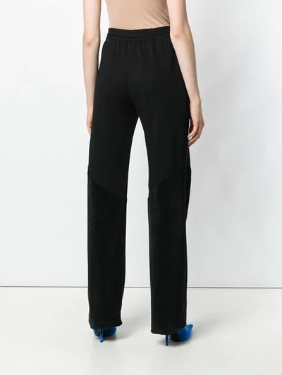 Shop Givenchy High Rise Track Pants In Black