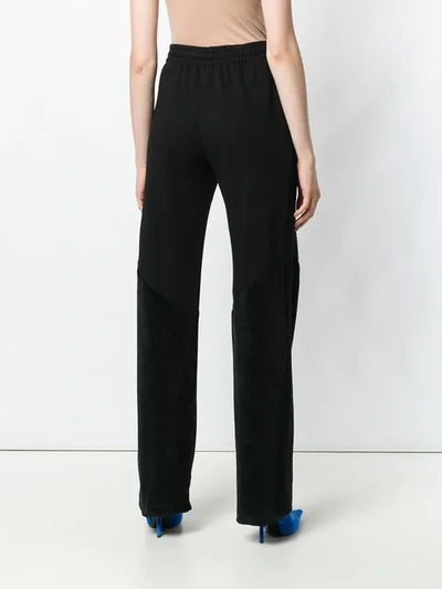 Givenchy Logo Trim Track Pants In Black