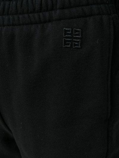 Shop Givenchy High Rise Track Pants In Black