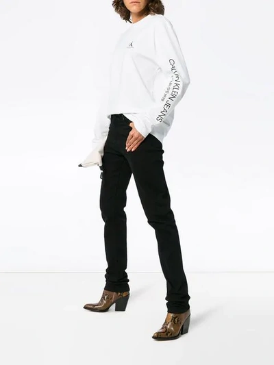 Shop Calvin Klein Jeans Est.1978 Ok Logo Long Sleeved T In White