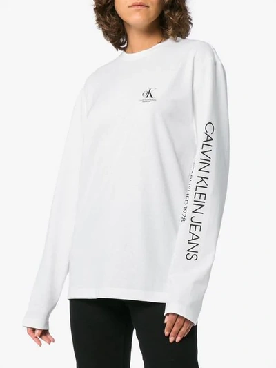 Shop Calvin Klein Jeans Est.1978 Ok Logo Long Sleeved T In White
