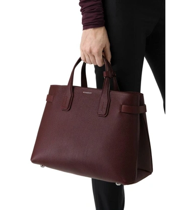 Shop Burberry Medium Banner Leather Tote In Mahogany Red