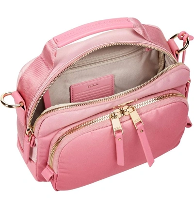 Shop Tumi Voyageur Troy Nylon Crossbody Bag - Pink In Pink Ombre