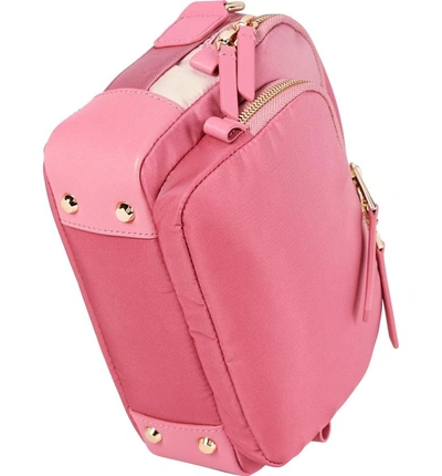 Shop Tumi Voyageur Troy Nylon Crossbody Bag - Pink In Pink Ombre