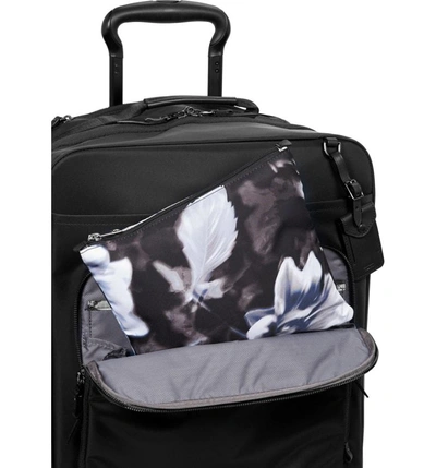 Shop Tumi Voyageur - Just In Case Nylon Travel Backpack - Black In Photo Floral