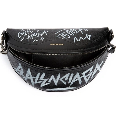 Shop Balenciaga Graffiti Souvenir Leather Belt Bag - Black In Noir/ Blanc