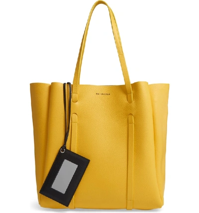 Shop Balenciaga Small Everyday Calfskin Tote - Yellow In Yellow/ Noir