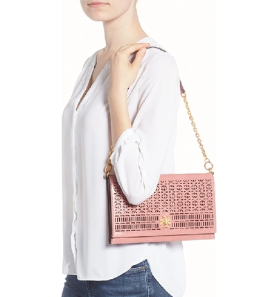 Shop Tory Burch Kira Perforated Leather Clutch In Pink Magnolia