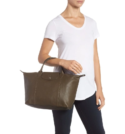 Shop Longchamp Medium 'le Pliage Cuir' Leather Top Handle Tote - Green In Khaki