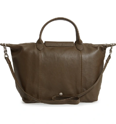 Shop Longchamp Medium 'le Pliage Cuir' Leather Top Handle Tote - Green In Khaki