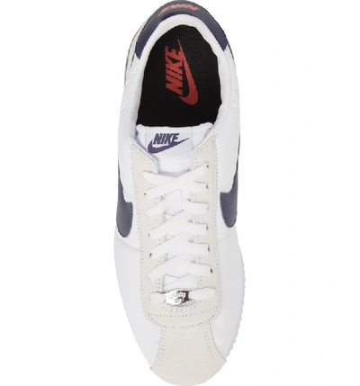 Shop Nike Cortez Basic Nylon Sneaker In White/ Indigo/ Habanero Red