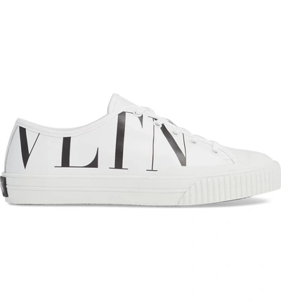 Shop Valentino Vltn Low Top Sneaker In White/ Black