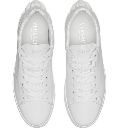 Shop Versace Sculpted Medusa Low Top Sneaker In White