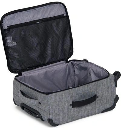 Shop Herschel Supply Co Highland Wheeled Suitcase - Grey In Raven Crosshatch