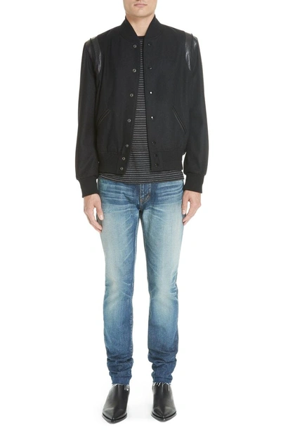 Shop Saint Laurent Cutoff Skinny Jeans In 4351 Blue