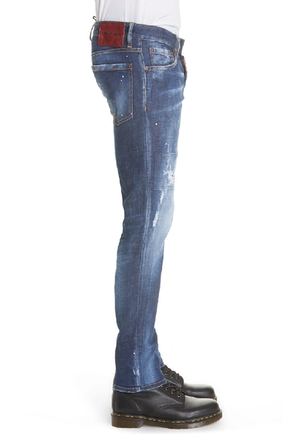Shop Dsquared2 Paint Splatter Slim Fit Jeans In Blue