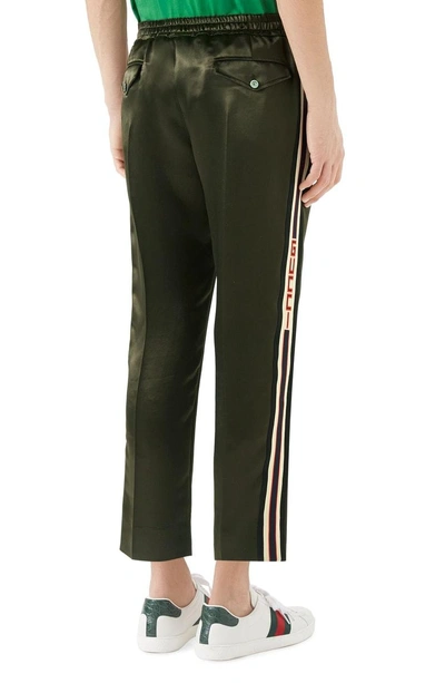 Shop Gucci Track Pants In Green