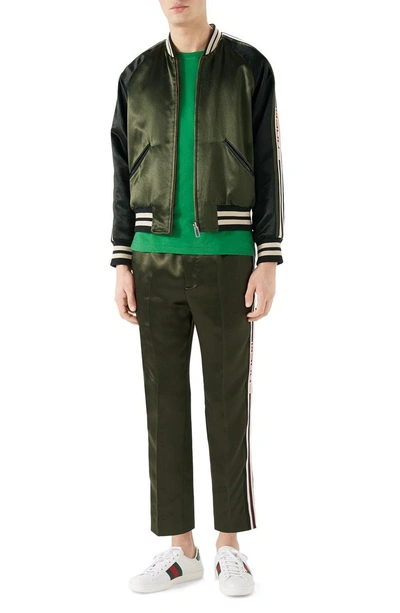 Shop Gucci Track Pants In Green