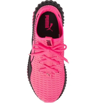 Shop Puma Defy Sneaker In Knockout Pink/  Black