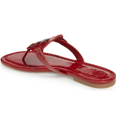 Tory Burch Miller Medallion Patent Leather Flat Thong Sandals In Dark  Redstone | ModeSens