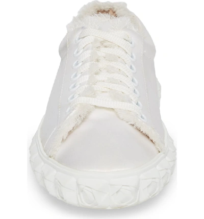 Shop Stuart Weitzman Fringe Sneaker In White Silk Satin