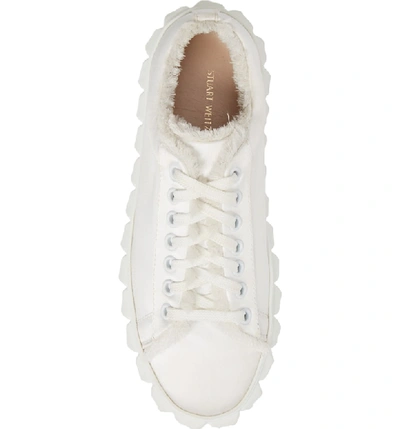 Shop Stuart Weitzman Fringe Sneaker In White Silk Satin