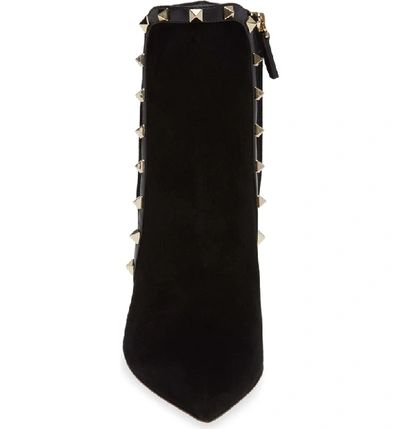 Shop Valentino Rockstud Bootie In Black