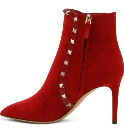 Shop Valentino Rockstud Bootie In Red