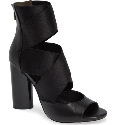 Shop Donna Karan Briana Strappy High Sandal In Black Calf Shiny Satin Elastic