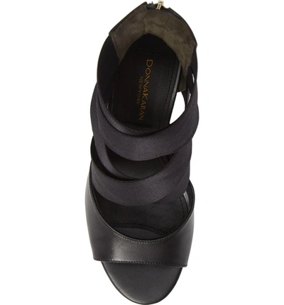 Shop Donna Karan Briana Strappy High Sandal In Black Calf Shiny Satin Elastic