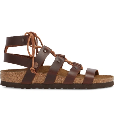 Shop Birkenstock Cleo Gladiator Sandal In Cognac Leather
