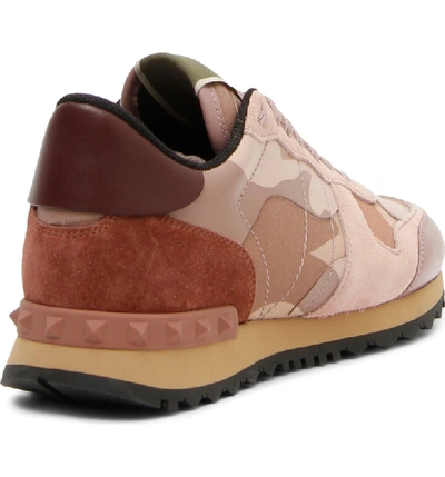 Shop Valentino Rockstud Sneaker In Poudre/ Rose