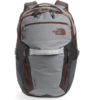Shop The North Face Surge Backpack - Grey In Zinc Grey Heather/ Sequoia Red