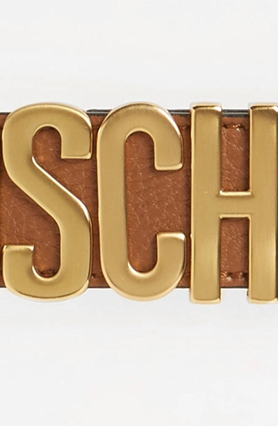 Shop Moschino Logo Leather Belt In Brown With Gold