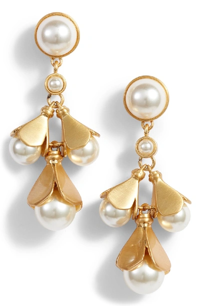 Shop Tory Burch Bellflower Drop Earrings In Pearl / Brass