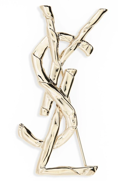 Shop Saint Laurent Drape Monogram Pin In Gold