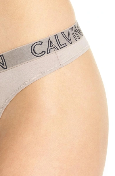 Shop Calvin Klein Ultimate Thong In Silver Rose