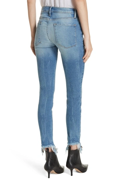 Shop Frame Le Skinny De Jeanne Fray Hem Stiletto Jeans In Dupont