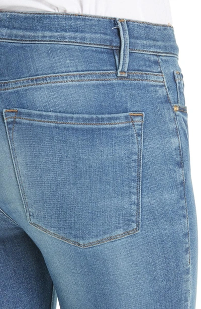 Shop Frame Le Skinny De Jeanne Reverse Cascade Hem Jeans In Cape May
