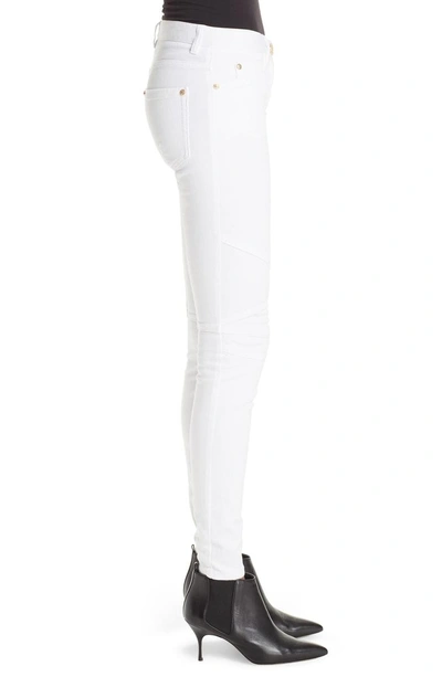 Shop Balmain Skinny Moto Jeans In White