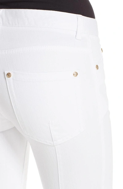 Shop Balmain Skinny Moto Jeans In White