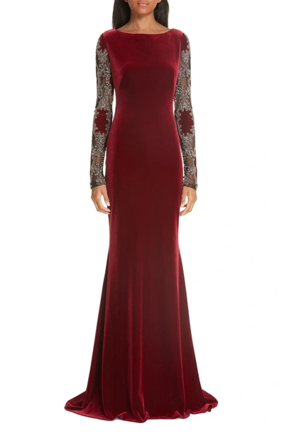Shop Badgley Mischka Embellished Sleeve Velvet Gown In Ruby