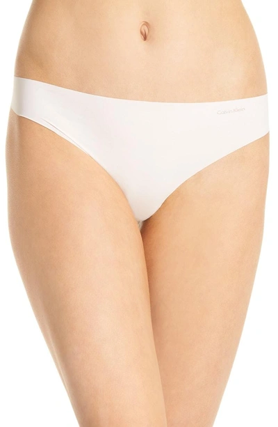 Shop Calvin Klein 'invisibles' Thong In Nymphs Thigh