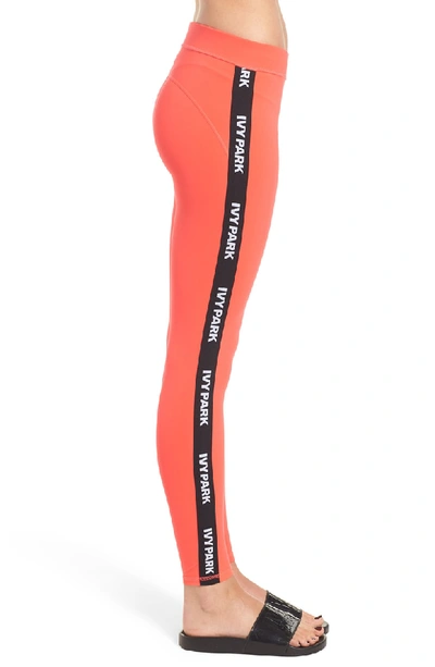Shop Ivy Park Elastic Logo Mid Rise Leggings In Neon Red