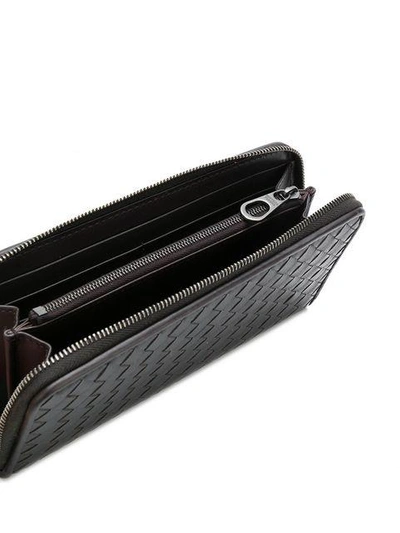 Shop Bottega Veneta Intrecciato Zip-around Wallet In Black